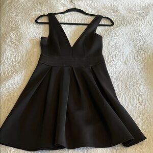 Black plunge pleated mini dress